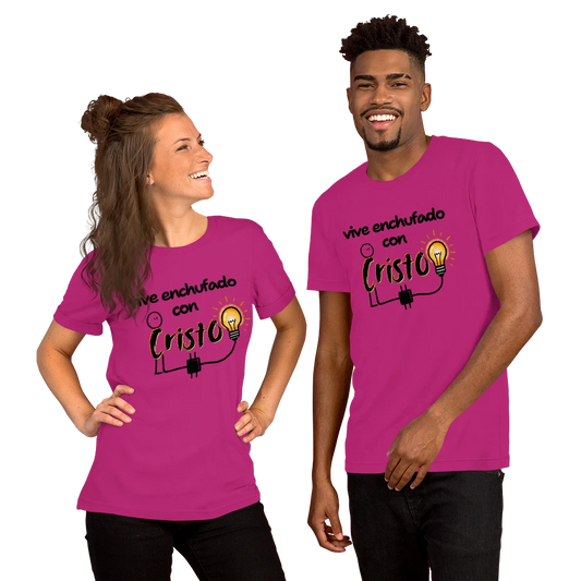 Crown & Cross Co. unisex magenta 100% cotton t-shirt with "Vive Enchufado con Cristo" graphic. Modern streetwear style.